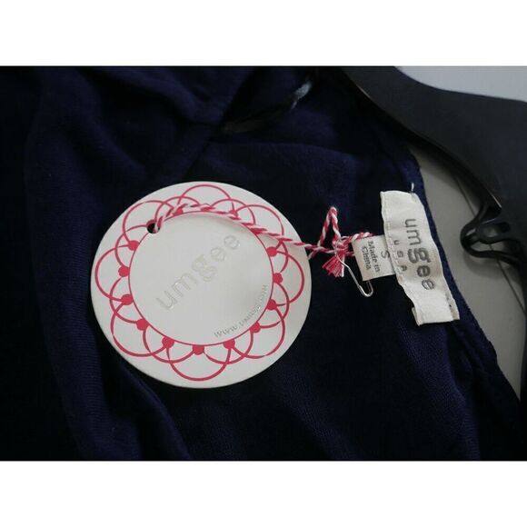 Umgee Linen Blend Back Lace Detail Round Neck Short Sleeve Top with Ruffle Hem S - Picture 7 of 8